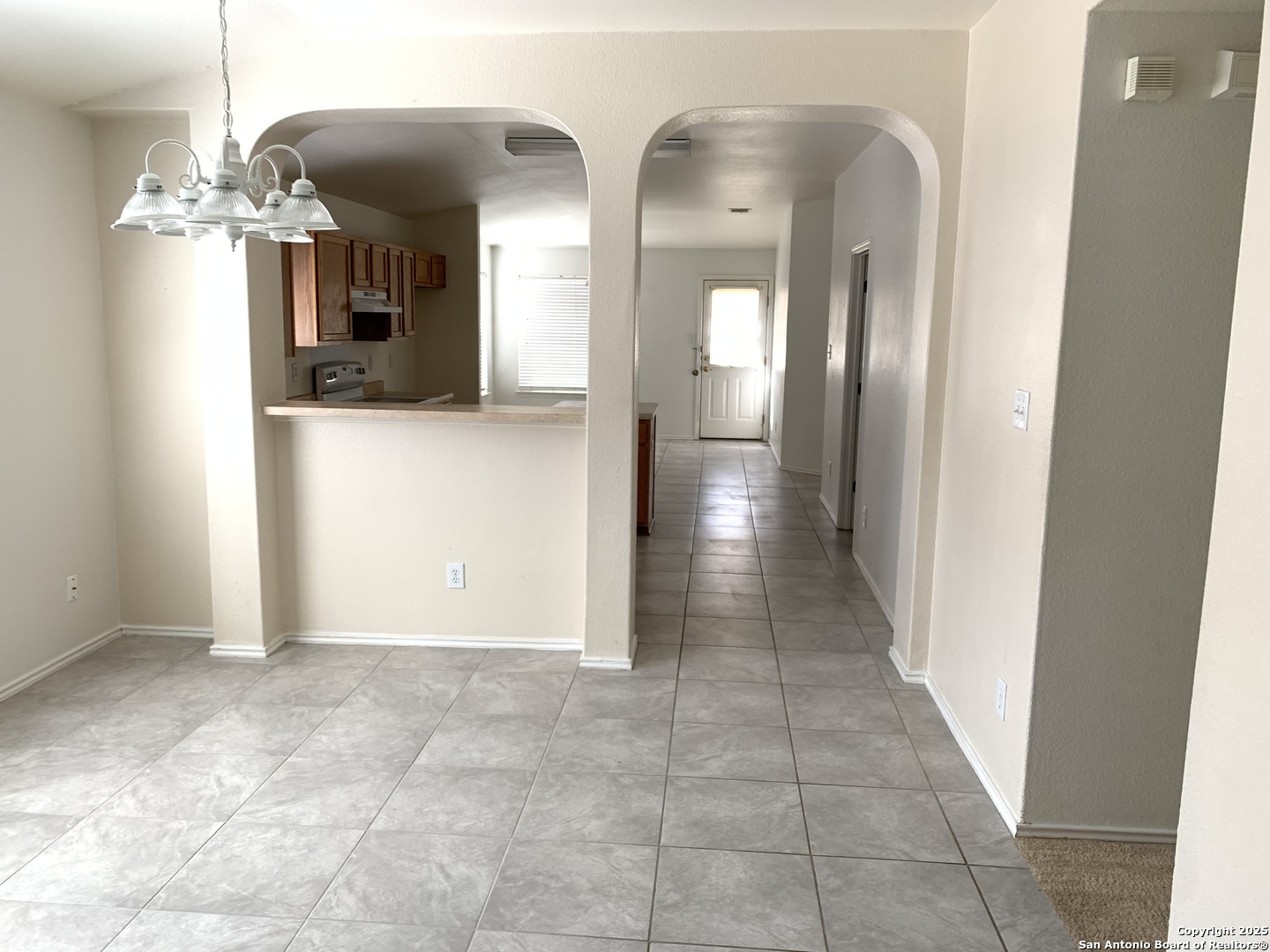 531 Rattler Bluff San Antonio, TX 78251 - Photo 8 of 36 a view of a hallway with wooden floor
