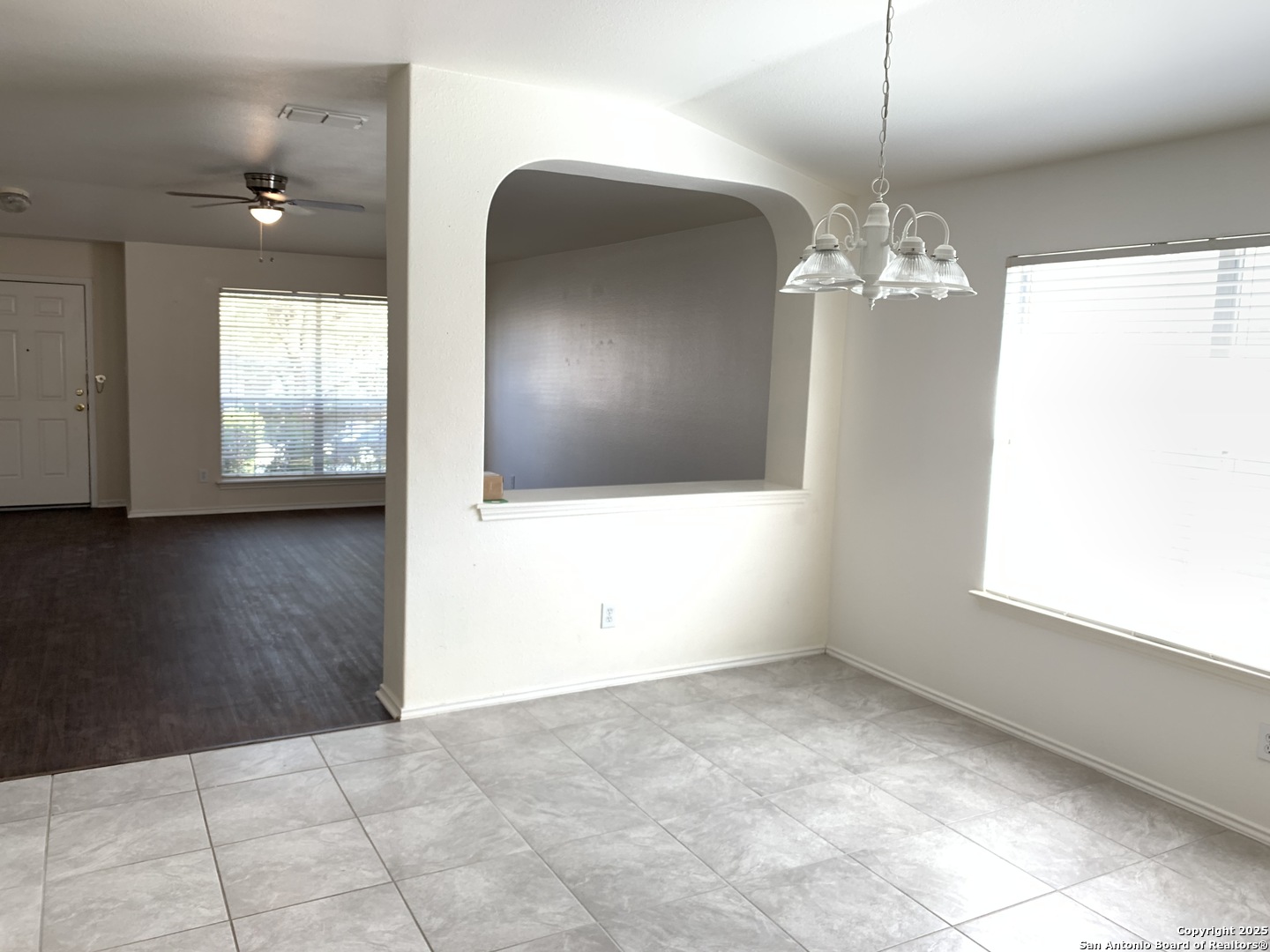 531 Rattler Bluff San Antonio, TX 78251 - Photo 9 of 36 a view of a livingroom with a chandelier