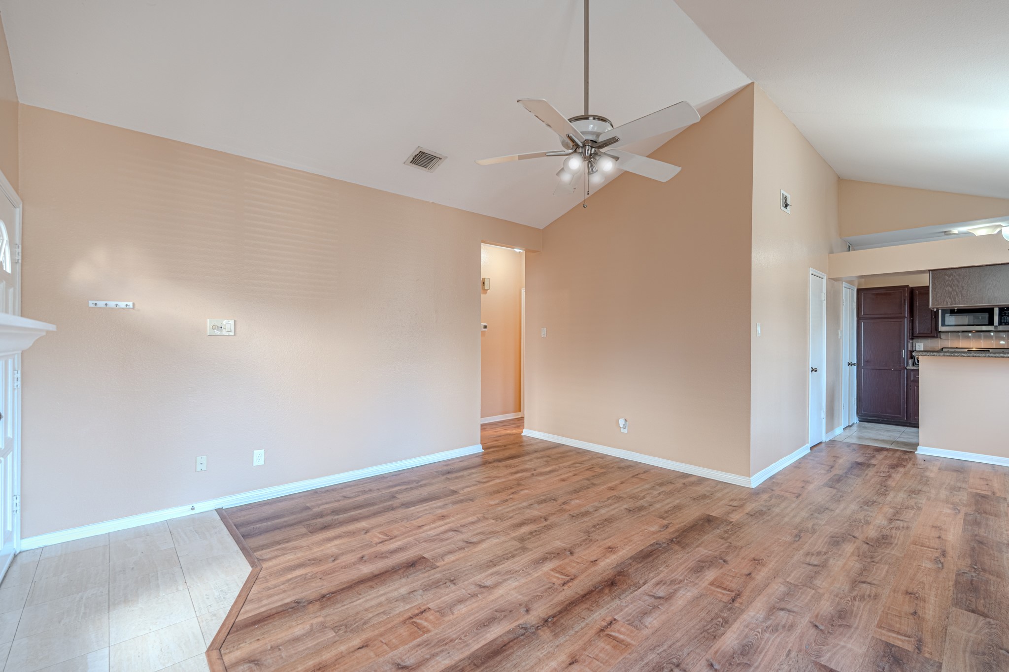 3500 Tangle Brush Drive, Unit 182 Spring, TX 77381 - Photo 9 of 24 a view of an empty room with a ceiling fan