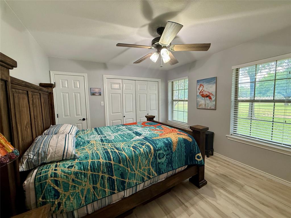2007 Deep Water Road May, TX 76857 - Photo 15 of 40 a bed sitting in a spacious bedroom next to a window
