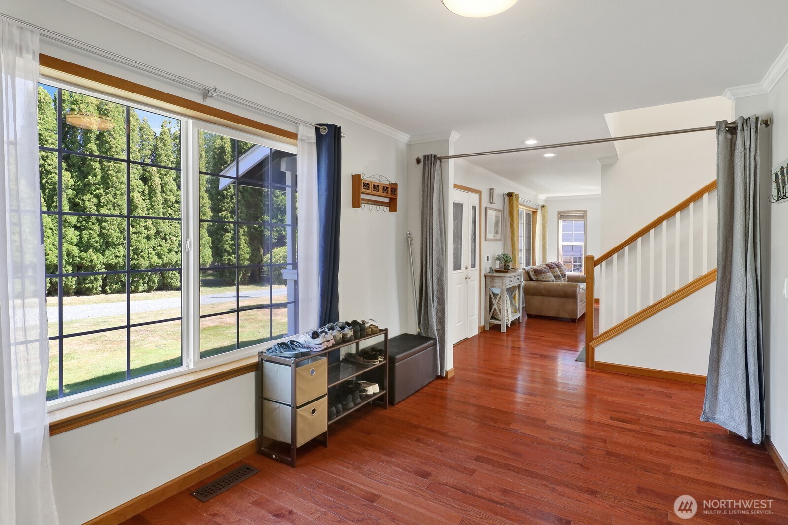 6149 Church Road Ferndale, WA 98248 - Photo 17 of 37 a room with wooden floors and large windows