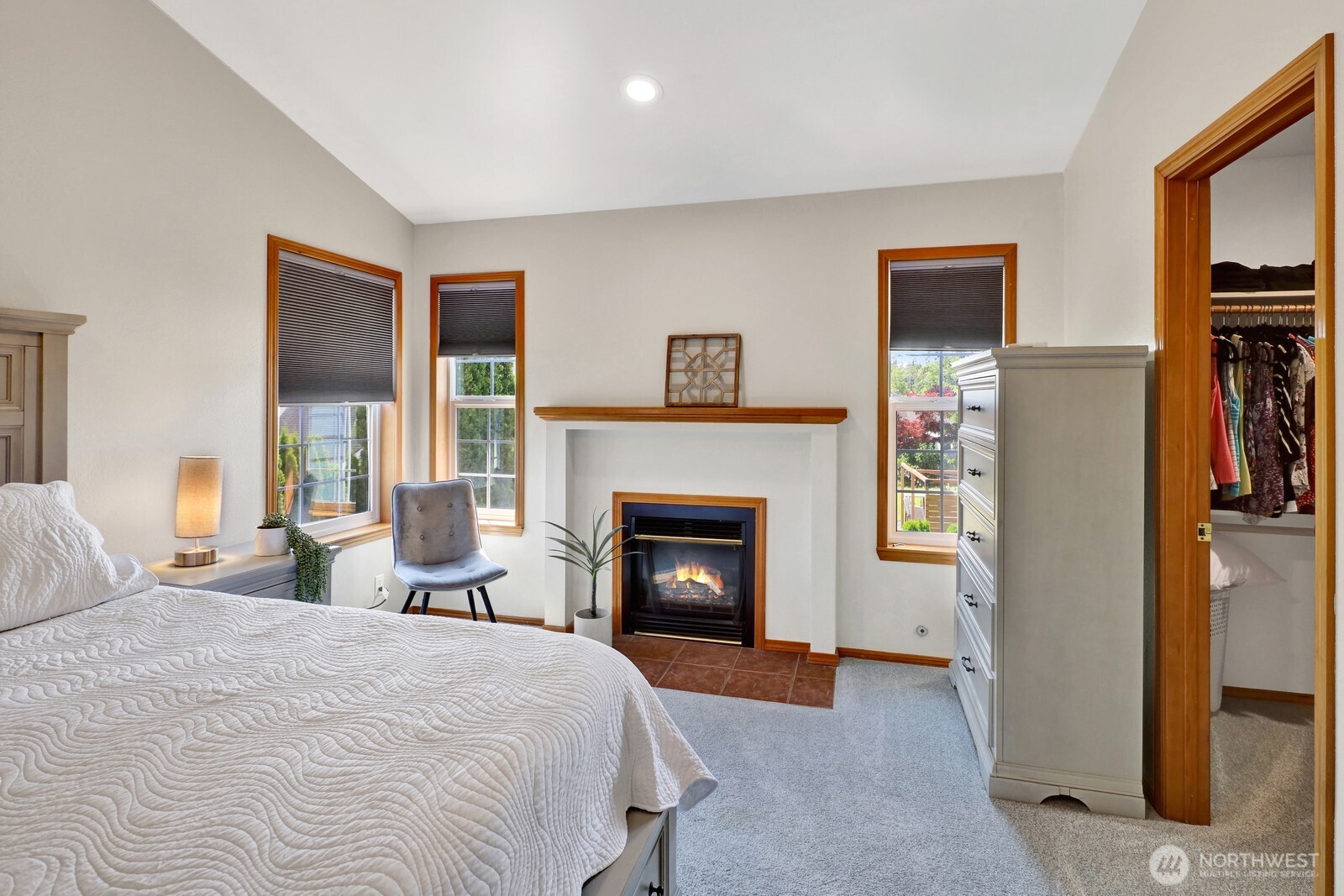 6149 Church Road Ferndale, WA 98248 - Photo 19 of 37 a bedroom with a bed and a fireplace