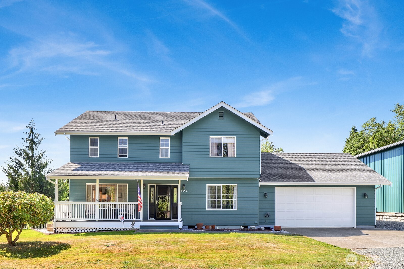6149 Church Road Ferndale, WA 98248 - Photo 2 of 37 a front view of a house with a yard
