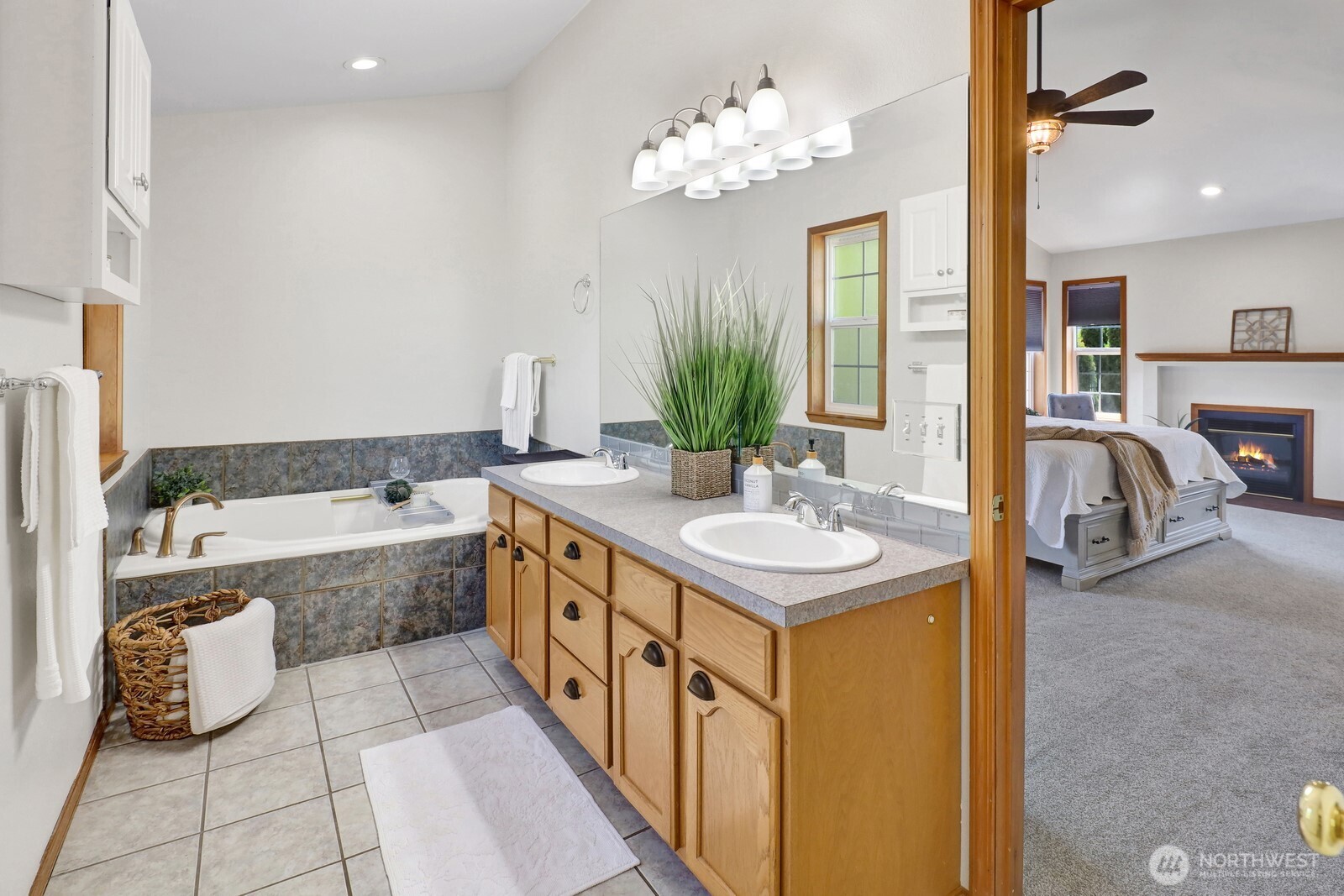 6149 Church Road Ferndale, WA 98248 - Photo 21 of 37 a bathroom with a tub sink and mirror