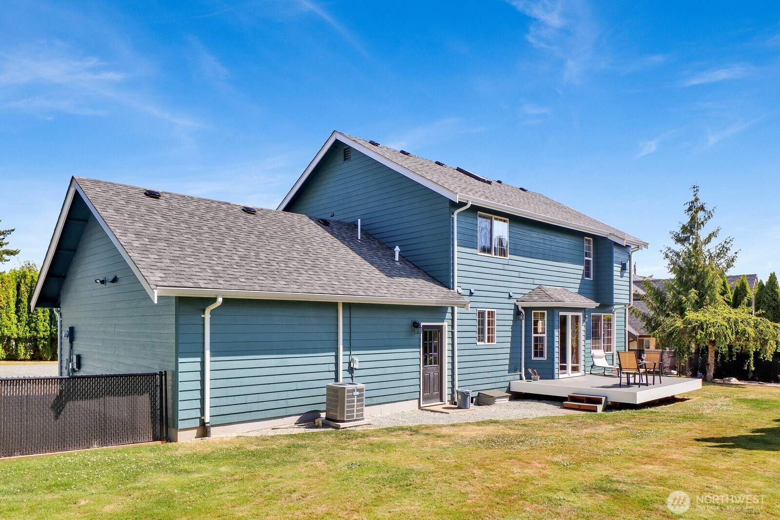6149 Church Road Ferndale, WA 98248 - Photo 30 of 37 a front view of a house with a garden and yard