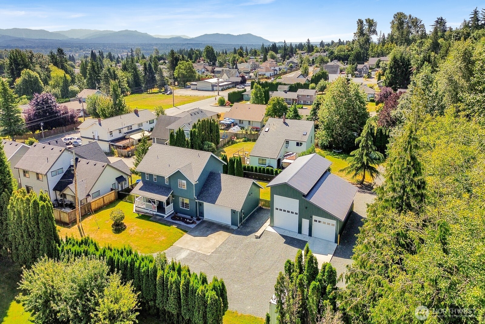 6149 Church Road Ferndale, WA 98248 - Photo 35 of 37 an aerial view of a house with swimming pool and ocean view