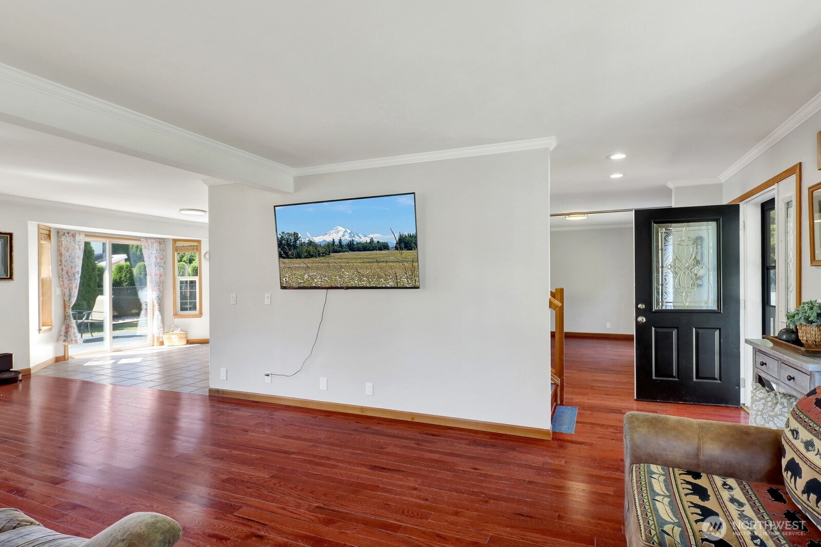 6149 Church Road Ferndale, WA 98248 - Photo 8 of 37 a view of an empty room with wooden floor and a window