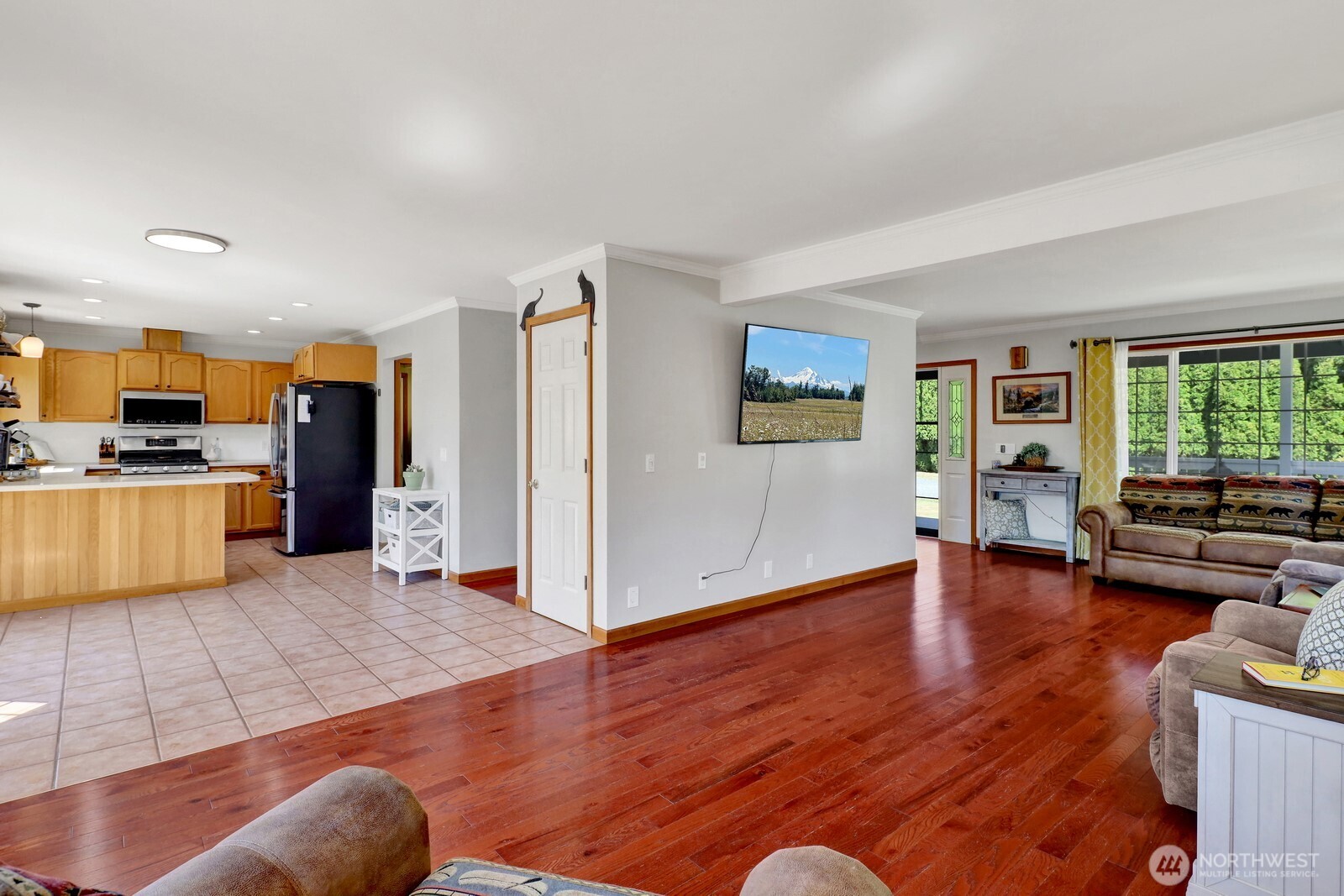 6149 Church Road Ferndale, WA 98248 - Photo 9 of 37 a view of a living room kitchen and a wooden floor