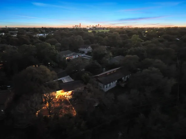 a sunset view with a lake
