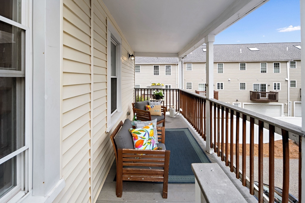 32 Harvard Street, Unit 2 Waltham, MA 02453 - Photo 24 of 32 a view of balcony with seating space