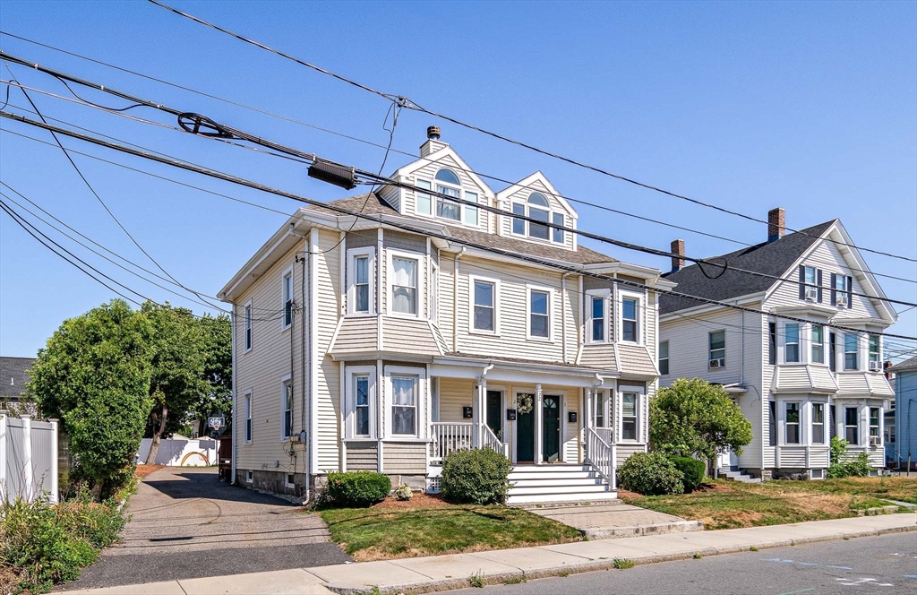 32 Harvard Street, Unit 2 Waltham, MA 02453 - Photo 25 of 32 a front view of a building
