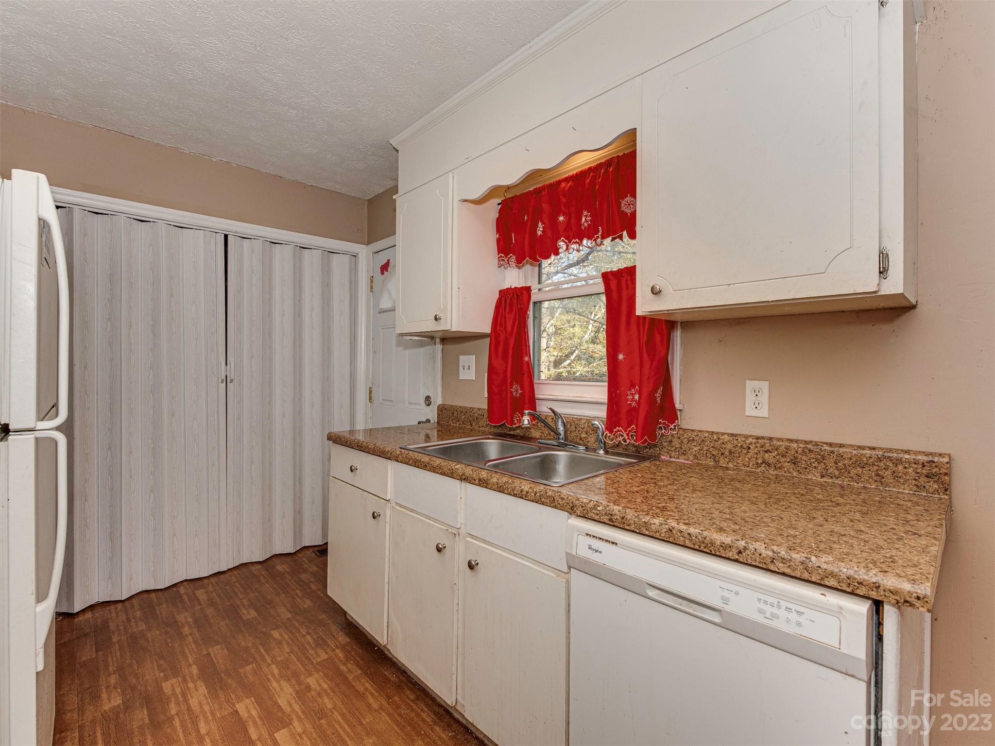 125 Eason Drive Rockingham, NC 28379 - Photo 11 of 26 a kitchen with stainless steel appliances granite countertop a sink and a cabinets