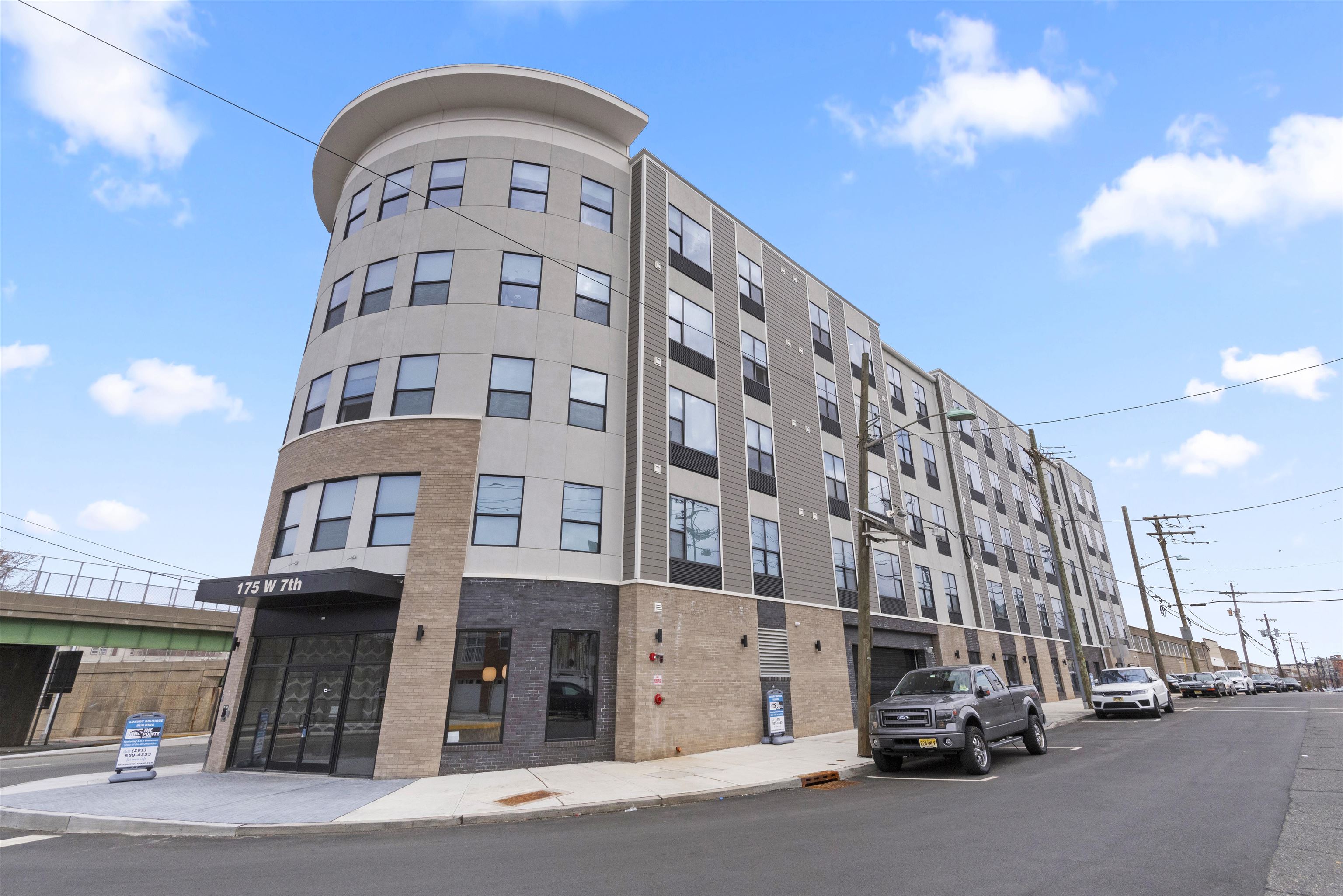 175 West 7th Street, Unit 407 Bayonne, NJ 07002 - Photo 17 of 24 a front view of a building