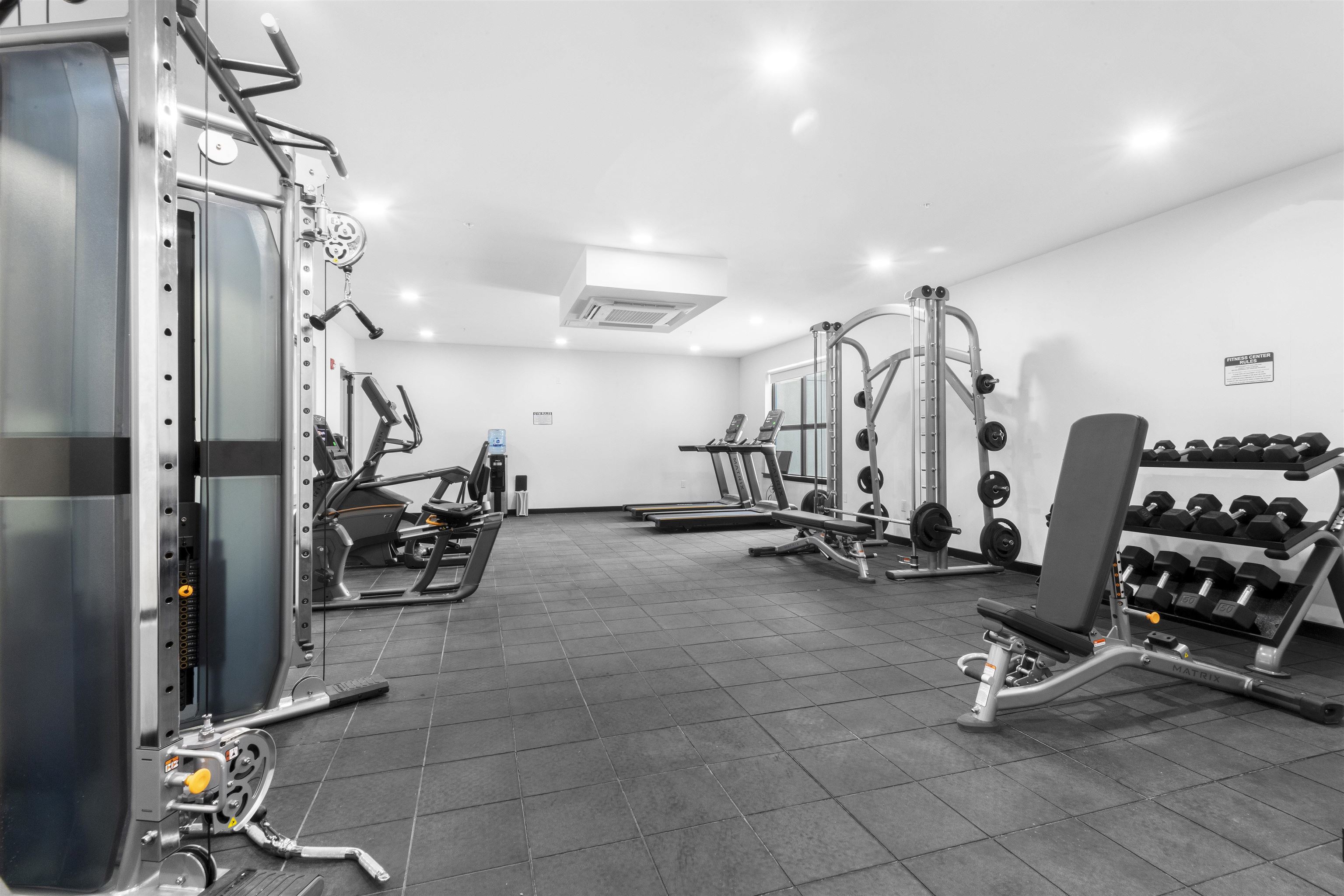 175 West 7th Street, Unit 407 Bayonne, NJ 07002 - Photo 23 of 24 a view of a room with gym equipment