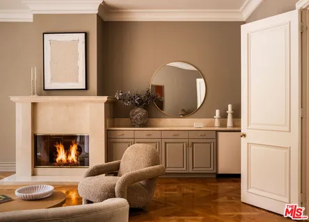 a swimming pool with a window and a kitchen counter top