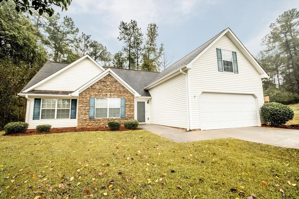 352 Autumn Ridge Trail Gray, GA 31032 - Photo 1 of 36 a view of a house with a yard