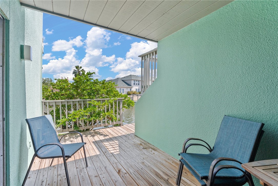 14300 Aloha Street, Unit 139 Corpus Christi, TX 78418 - Photo 11 of 26 a view of a chairs and table in patio