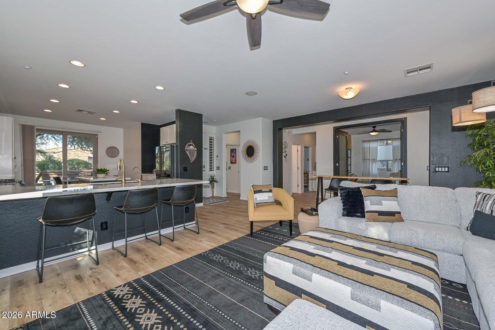 12917 West Red Fox Road Peoria, AZ 85383 - Photo 6 of 57 Great Room-Kitchen Bar