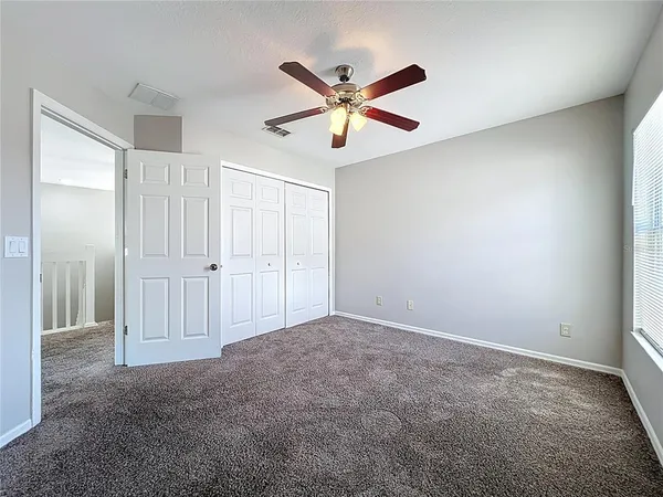 a bathroom with a tub shower and a sink