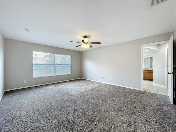 a bathroom with a bathtub and a sink