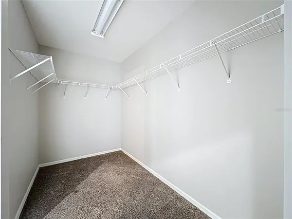 a aerial view of a house with swimming pool