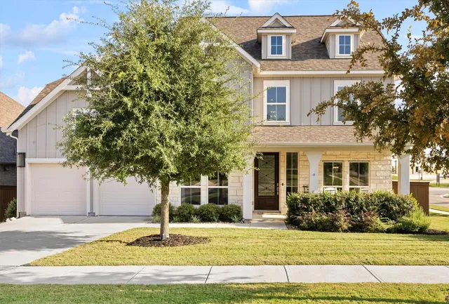 a view of a house with a swimming pool