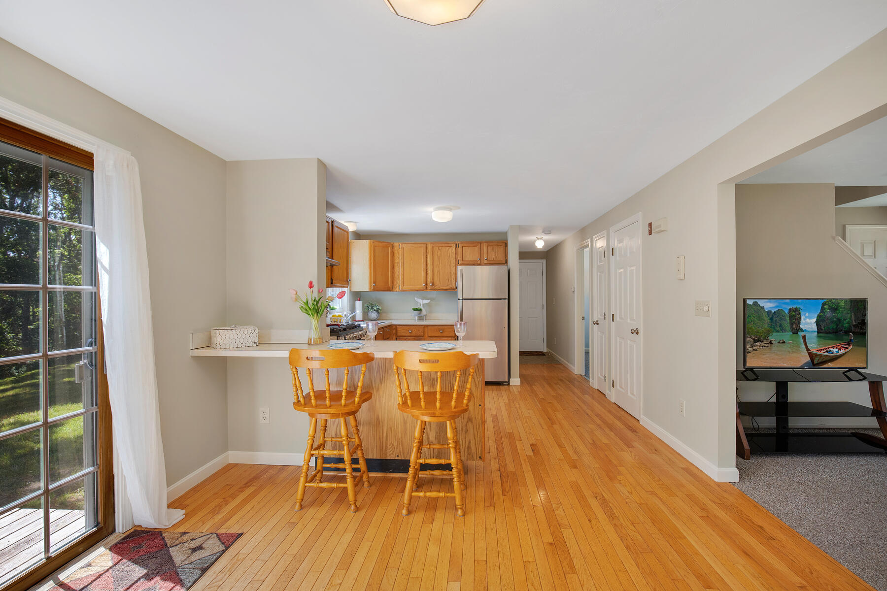 29 Carleton Drive Mashpee, MA 02649 - Photo 11 of 32 11 Kitchen with hall to bedroom and bath