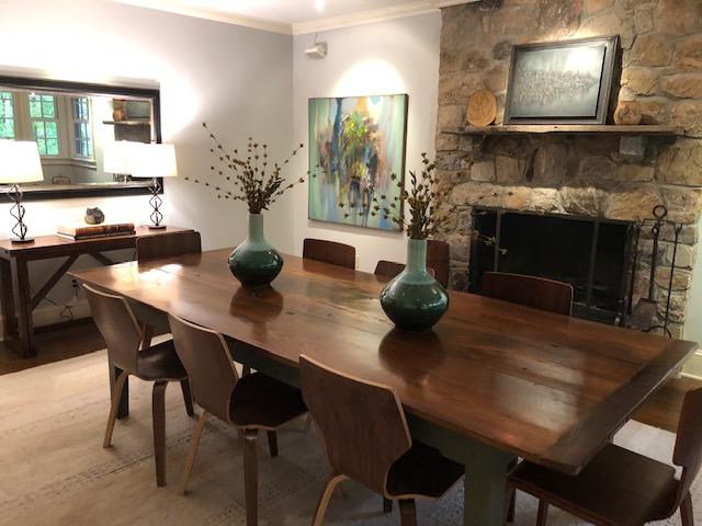 111 Old Kingdom Road Wilton, CT 06897 - Photo 12 of 57 a kitchen with a table and chairs in it