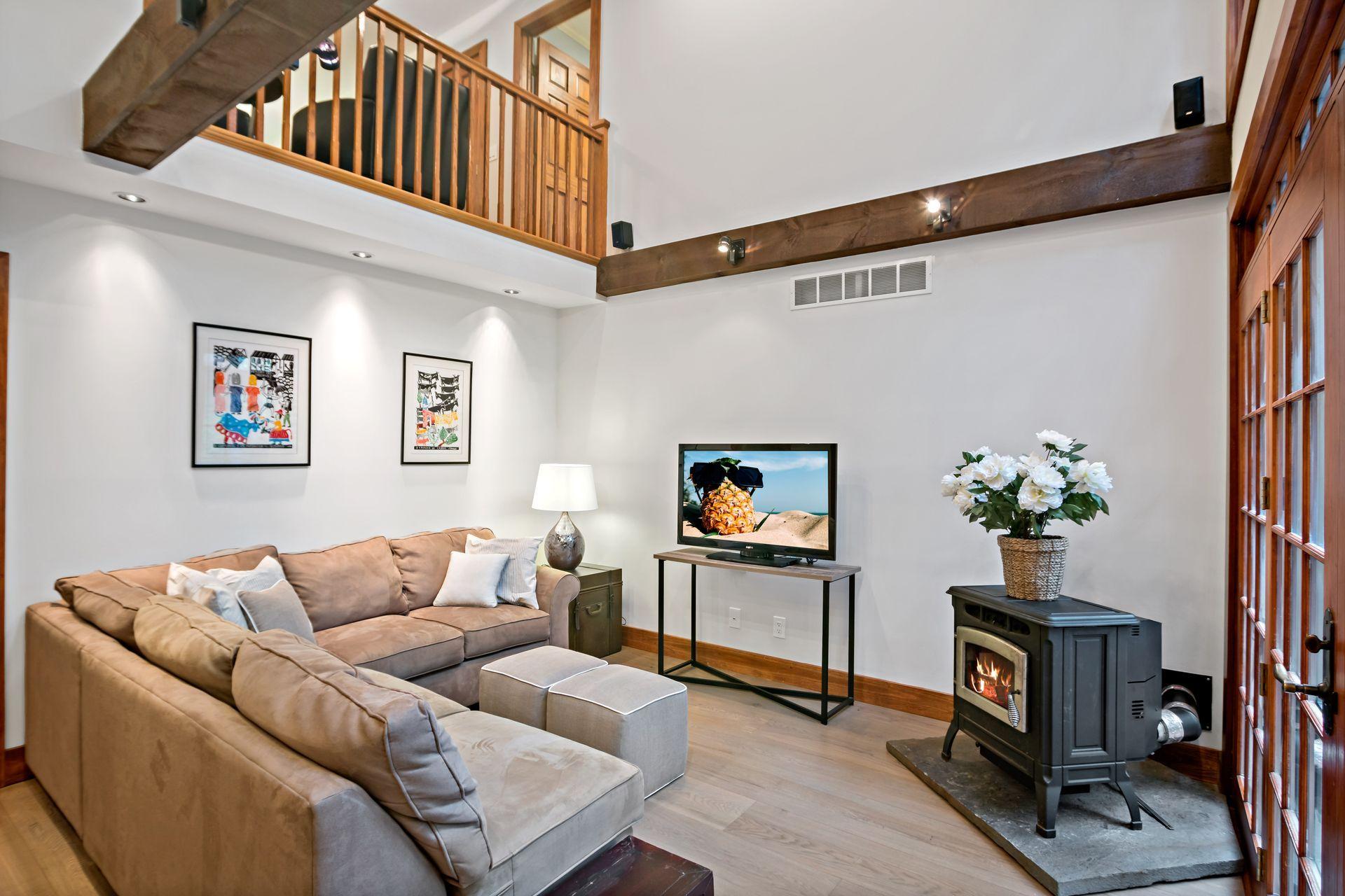 111 Old Kingdom Road Wilton, CT 06897 - Photo 14 of 57 a living room with furniture and a flat screen tv