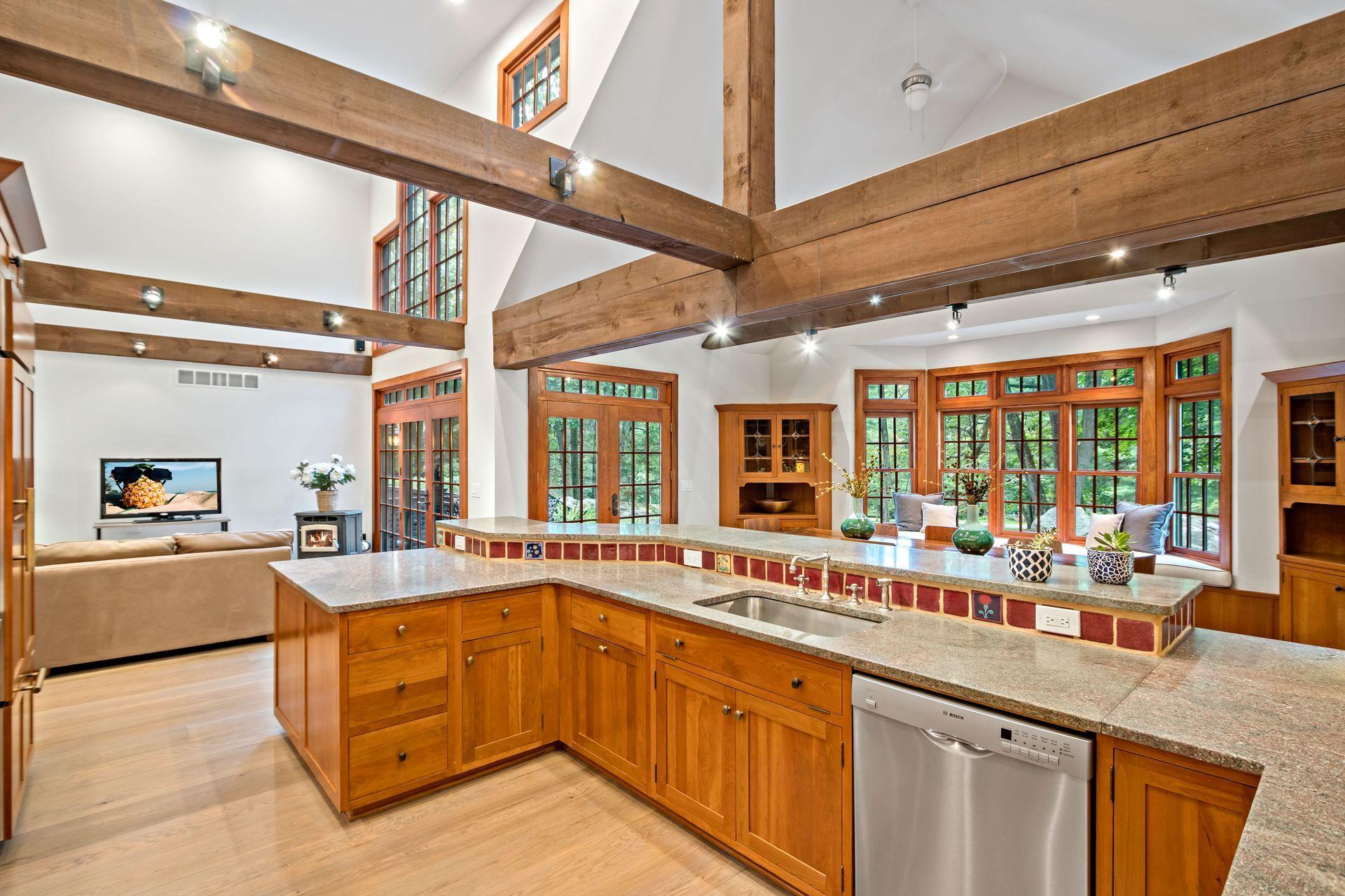 111 Old Kingdom Road Wilton, CT 06897 - Photo 15 of 57 a large kitchen with a large window