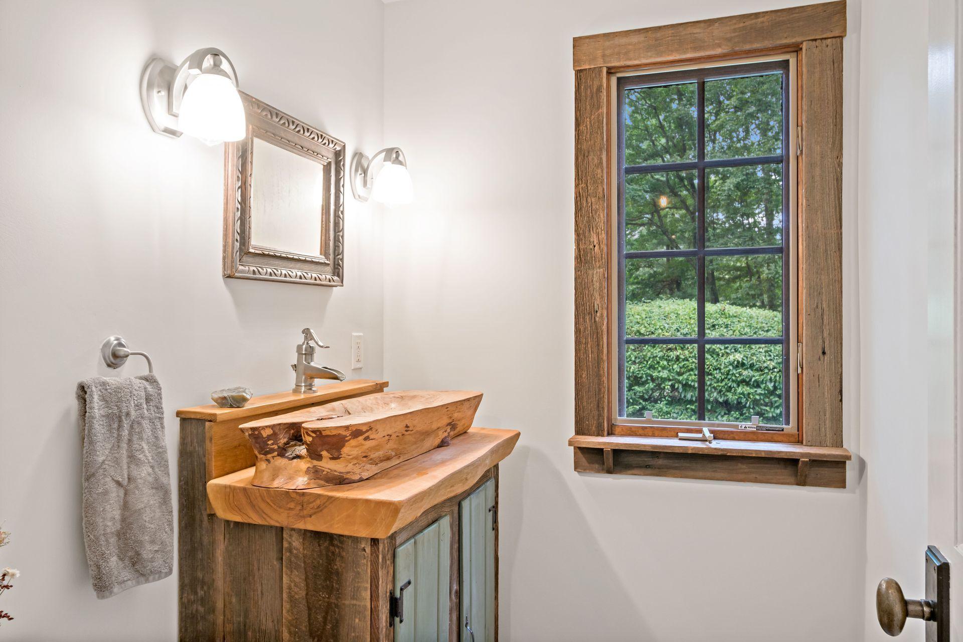 111 Old Kingdom Road Wilton, CT 06897 - Photo 24 of 57 a bathroom with a sink and a mirror