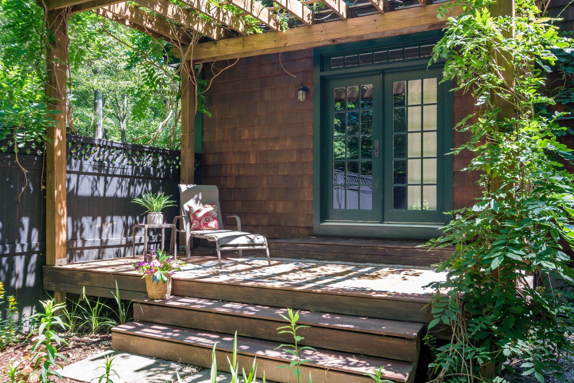 111 Old Kingdom Road Wilton, CT 06897 - Photo 33 of 57 a view of a brick house with a large windows