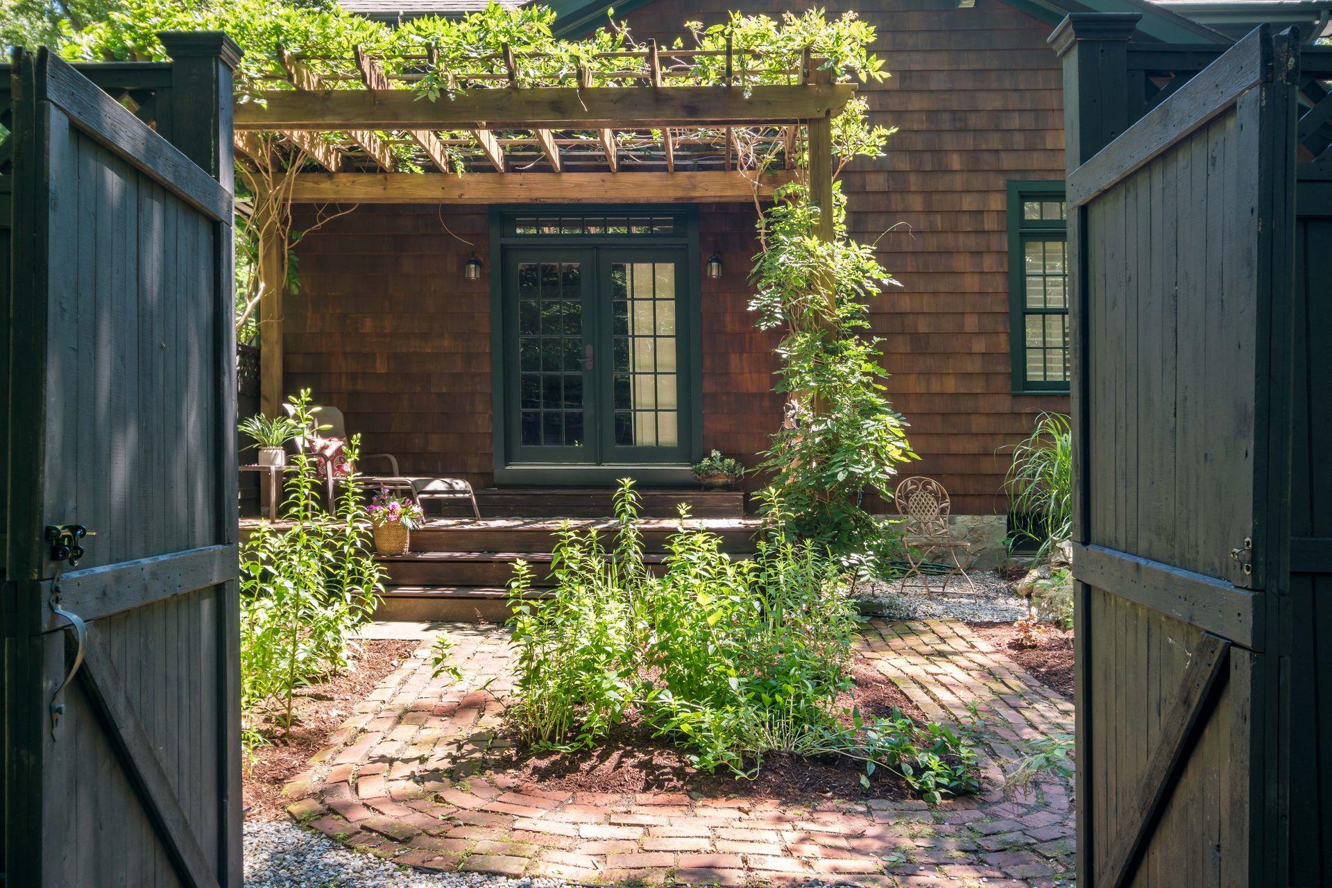111 Old Kingdom Road Wilton, CT 06897 - Photo 35 of 57 a front view of a house with a yard