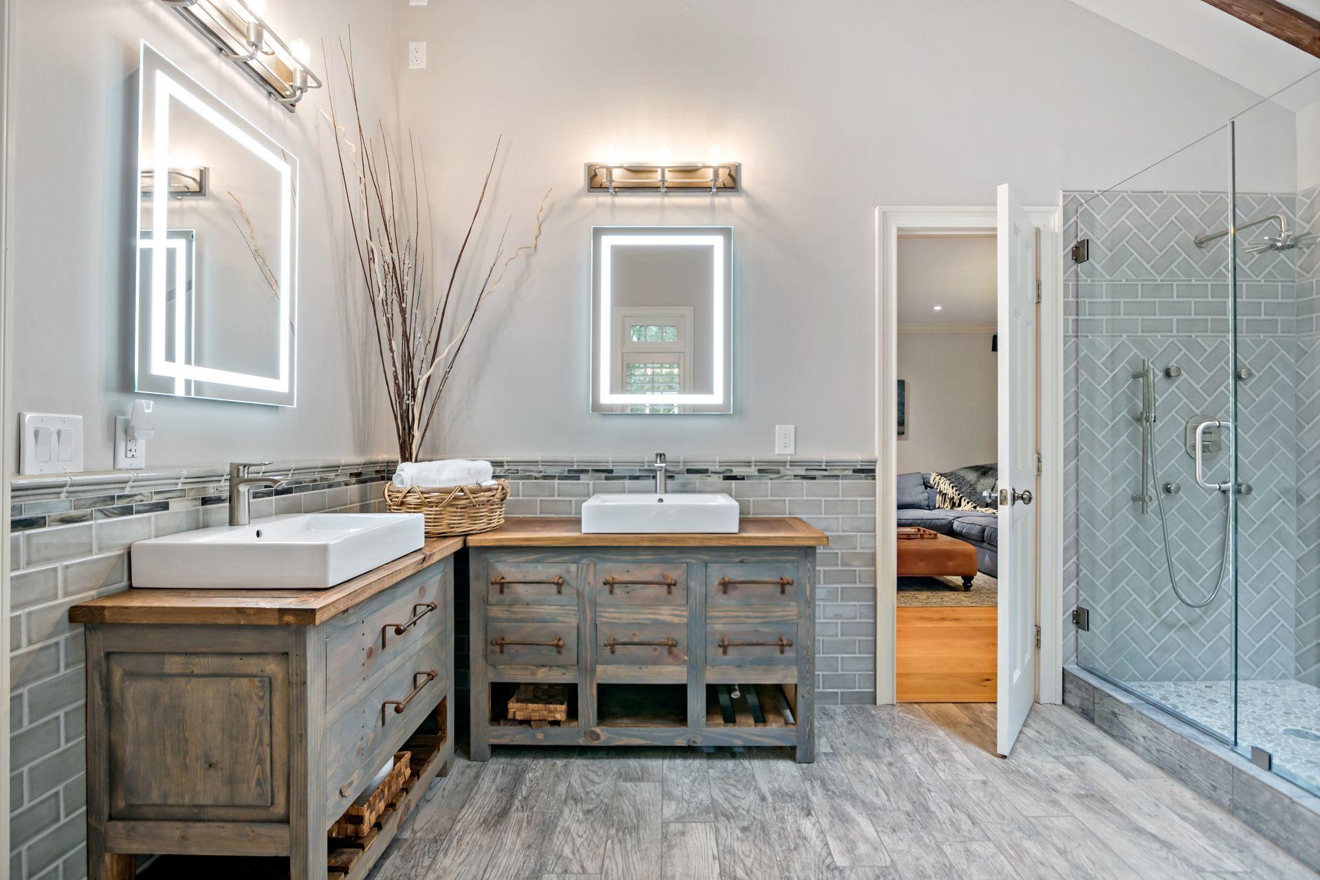 111 Old Kingdom Road Wilton, CT 06897 - Photo 36 of 57 a spacious bathroom with a double vanity sink a mirror and a shower