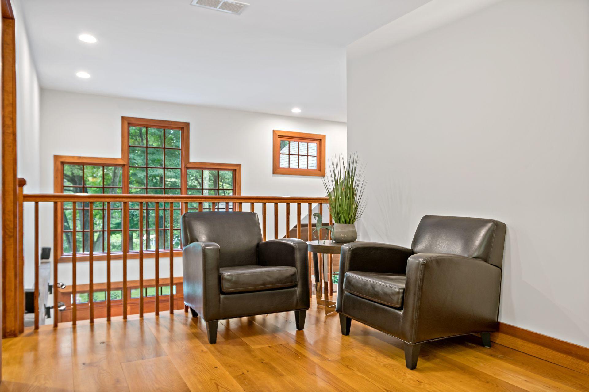 111 Old Kingdom Road Wilton, CT 06897 - Photo 39 of 57 a living room with furniture and wooden floor