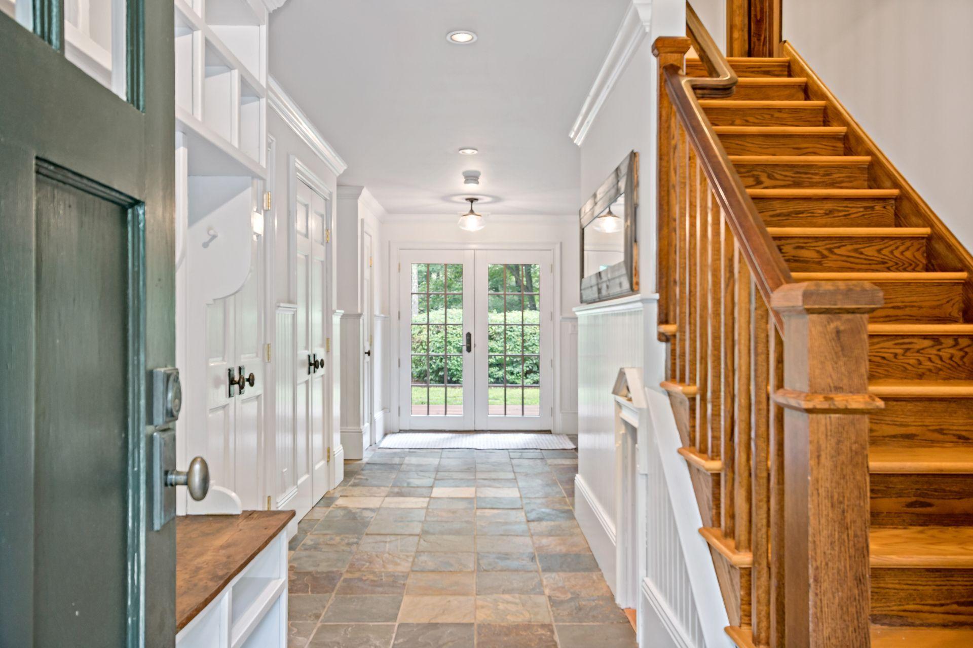 111 Old Kingdom Road Wilton, CT 06897 - Photo 47 of 57 a view of a balcony with furniture and front door