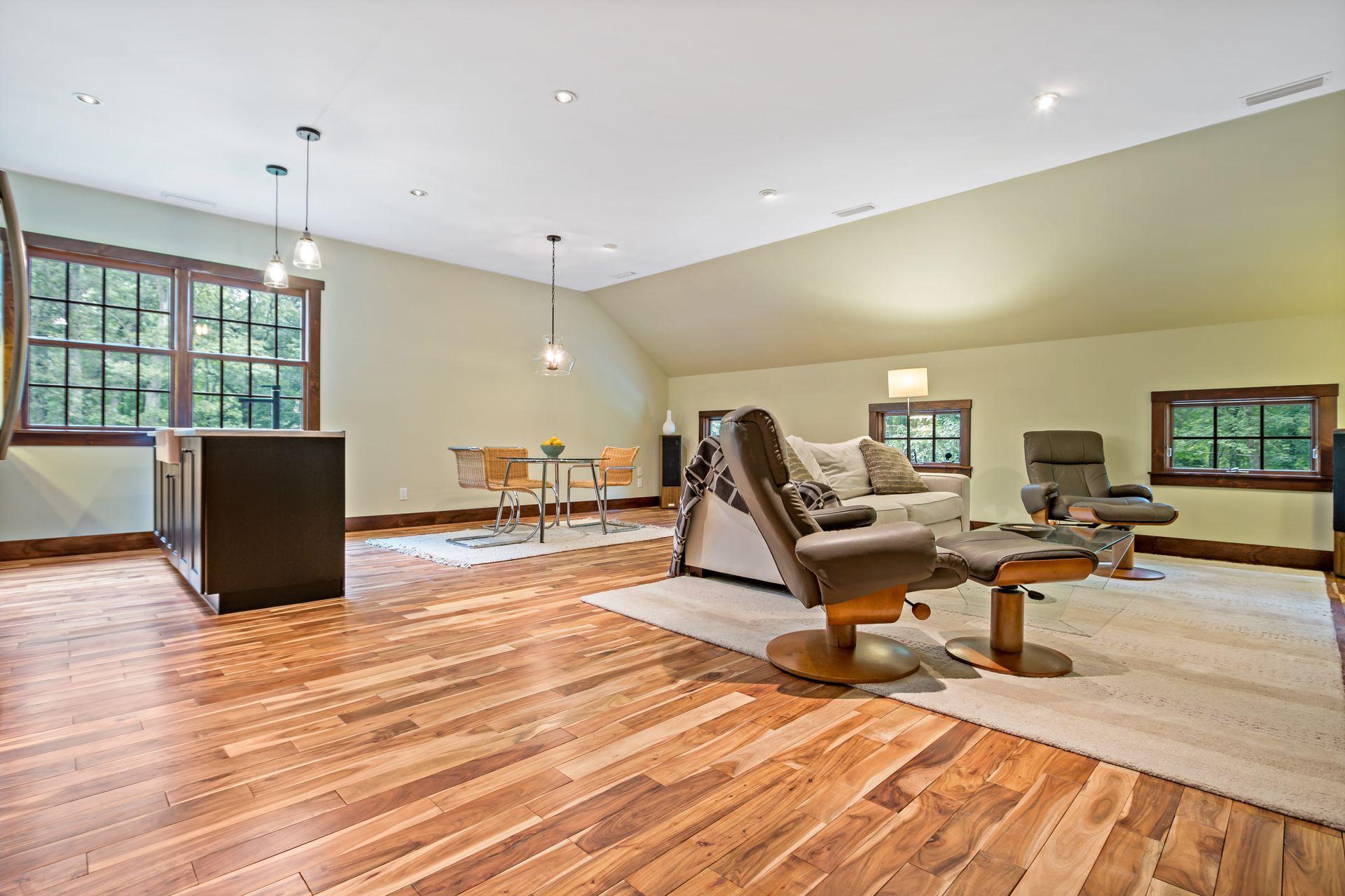 111 Old Kingdom Road Wilton, CT 06897 - Photo 49 of 57 a living room with furniture and a wooden floor