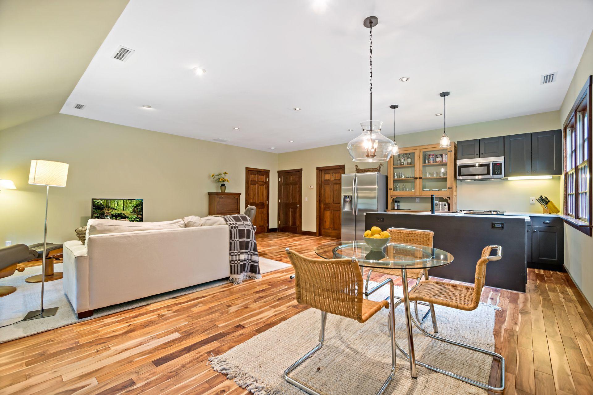 111 Old Kingdom Road Wilton, CT 06897 - Photo 50 of 57 a view of a dining room with furniture window and wooden floor