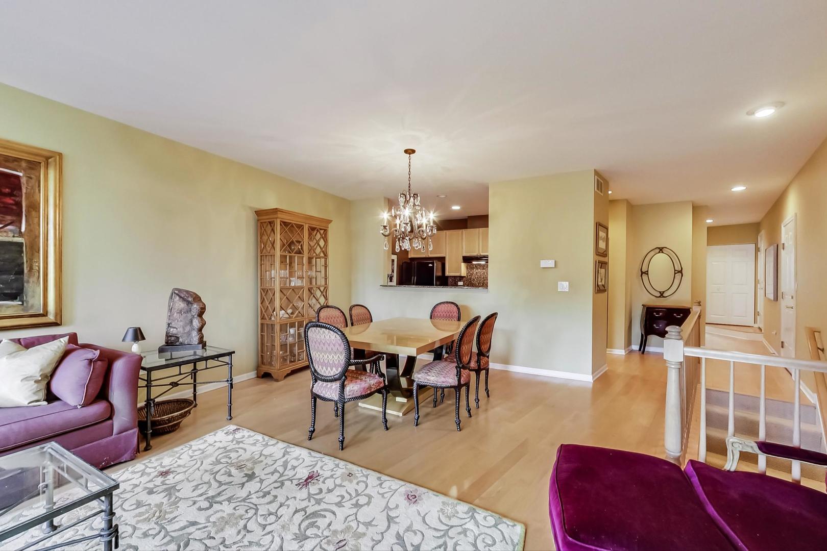 7742 North Sheridan Road, Unit 1L Chicago, IL 60626 - Photo 12 of 40 a view of a dining room with furniture