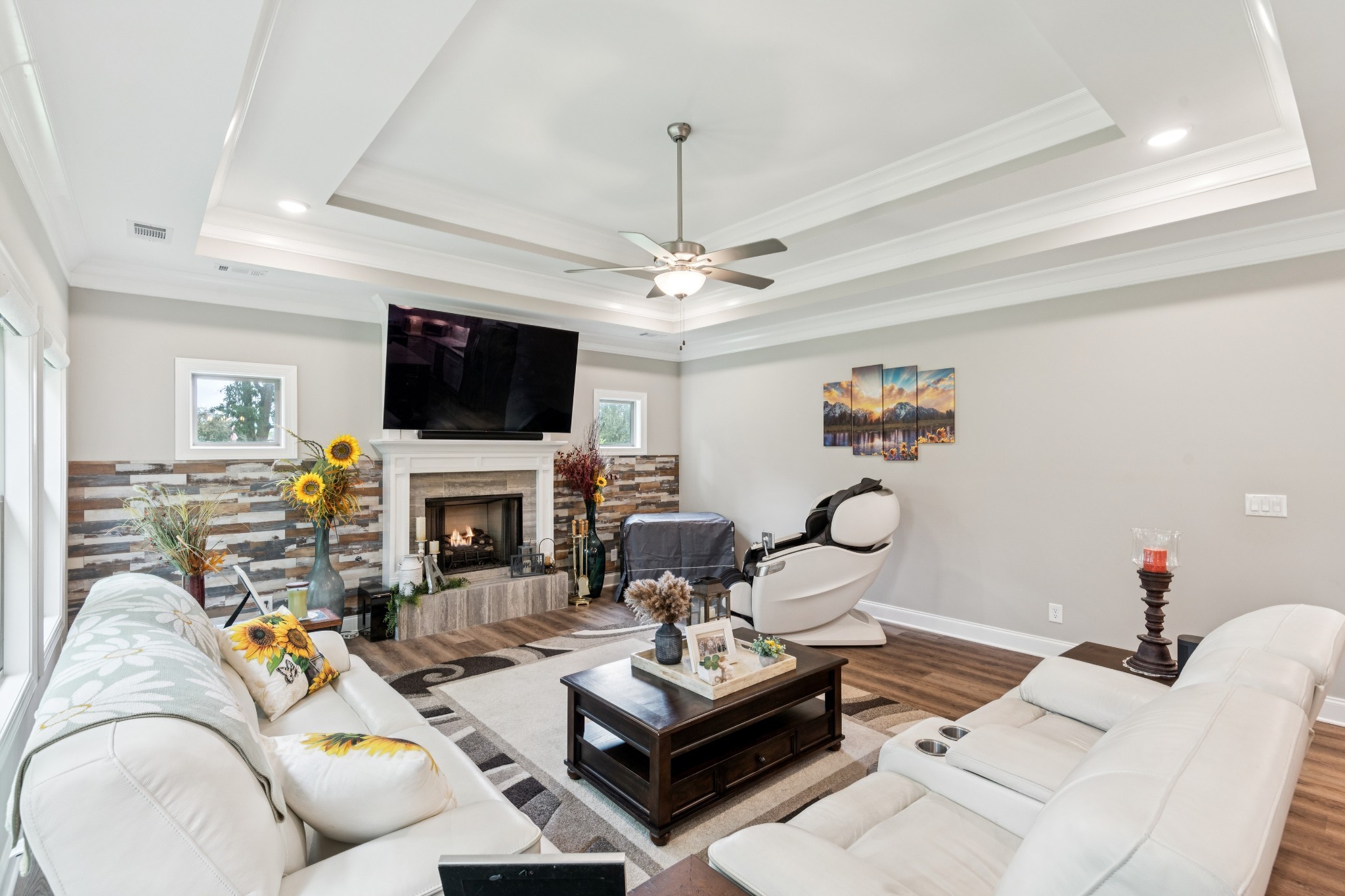 1908 Lucille Street Lebanon, TN 37087 - Photo 13 of 31 a living room with furniture a fireplace and a flat screen tv