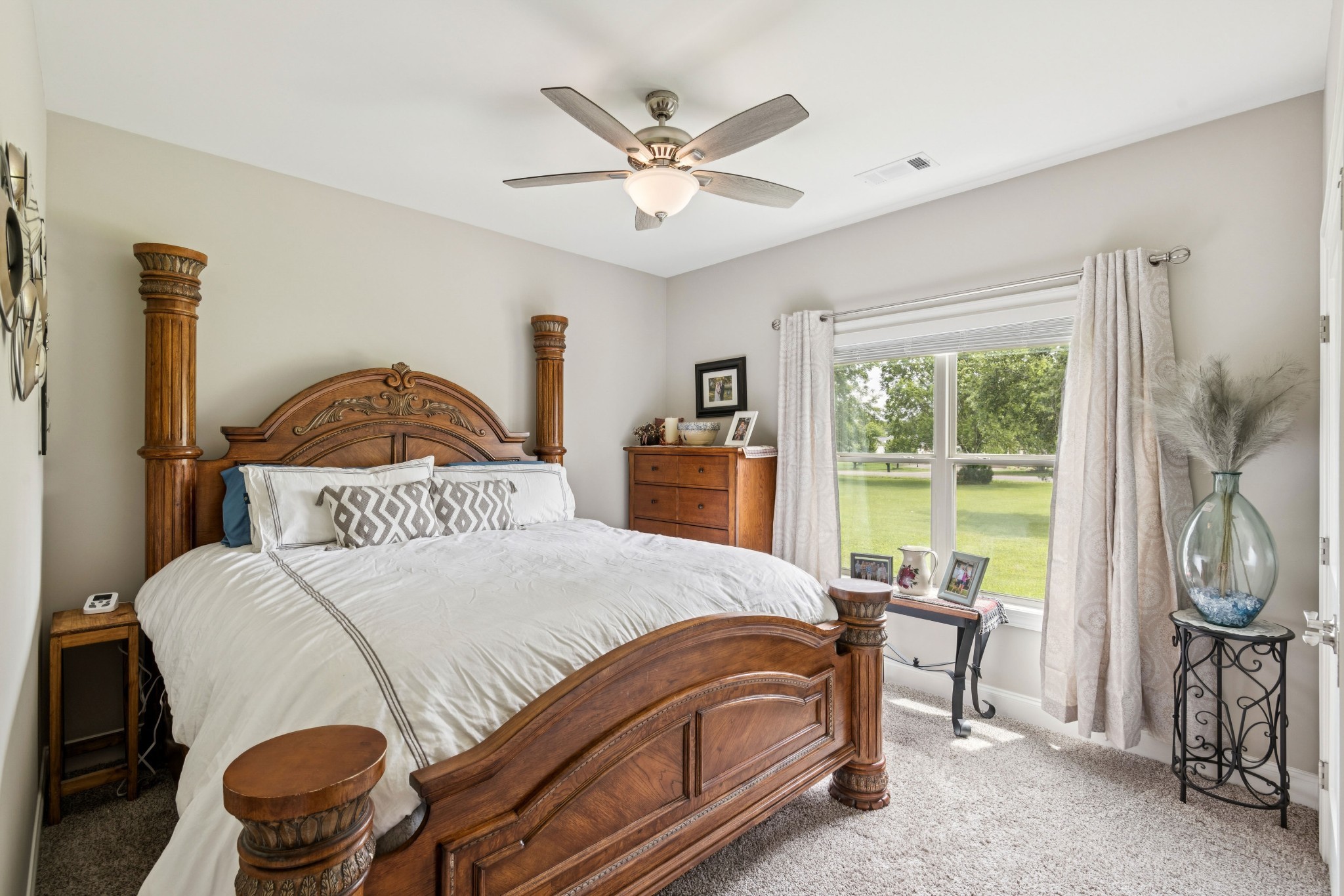 1908 Lucille Street Lebanon, TN 37087 - Photo 18 of 31 a bedroom with a bed and a chandelier