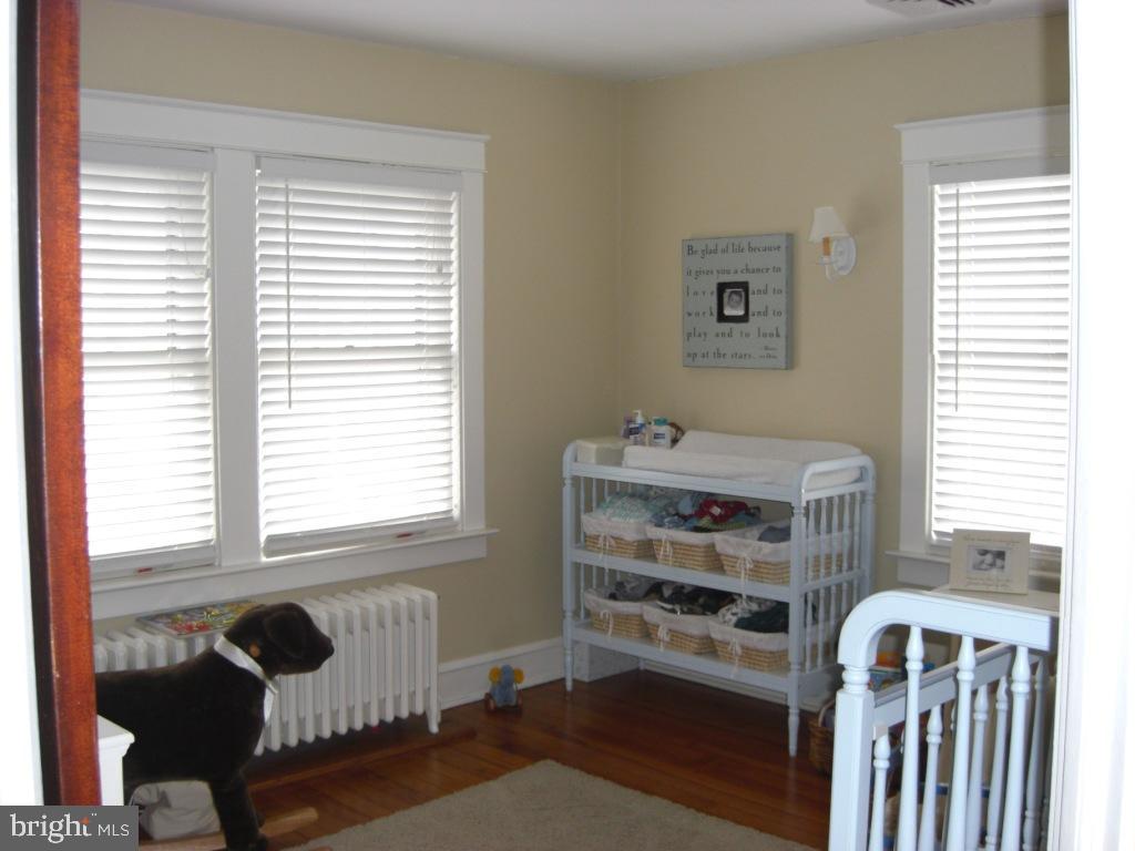 308 Front Street Lititz, PA 17543 - Photo 11 of 13 a bedroom with a bed and a window