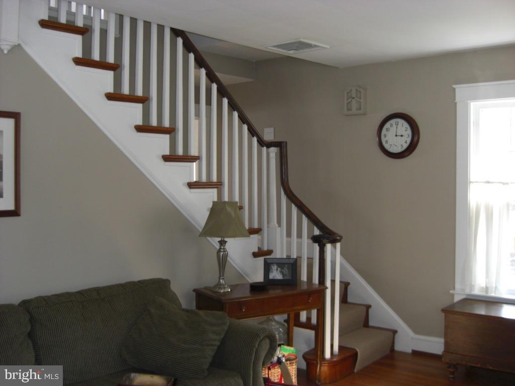 308 Front Street Lititz, PA 17543 - Photo 6 of 13 a view of entryway and hall with wooden floor