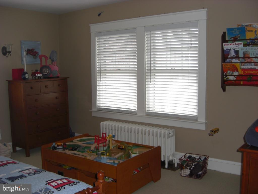 308 Front Street Lititz, PA 17543 - Photo 10 of 13 a living room with furniture and a window