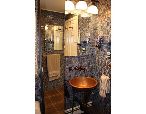 50 Mary Ellen Road Newton, MA 02468 - Photo 12 of 22 a bathroom with a sink and a mirror