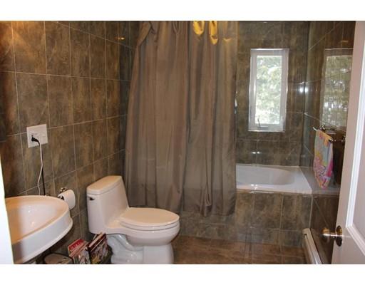 50 Mary Ellen Road Newton, MA 02468 - Photo 13 of 22 a bathroom with a toilet a sink and shower