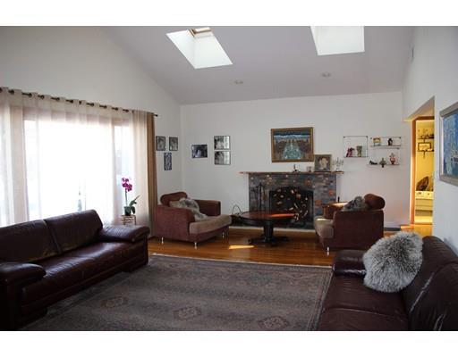 50 Mary Ellen Road Newton, MA 02468 - Photo 5 of 22 a living room with furniture and a fireplace