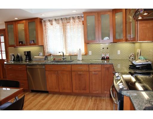 50 Mary Ellen Road Newton, MA 02468 - Photo 7 of 22 a kitchen with a sink a window and cabinets