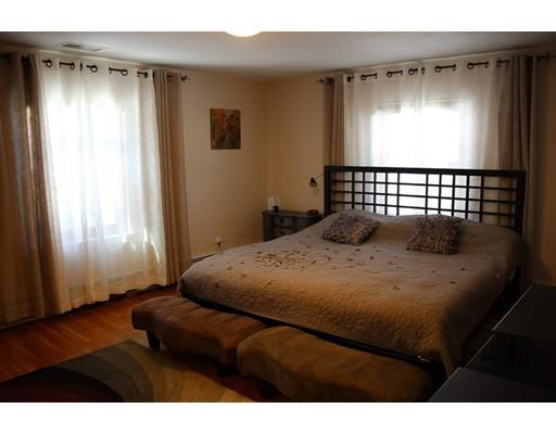 50 Mary Ellen Road Newton, MA 02468 - Photo 9 of 22 a bedroom with a bed and a window