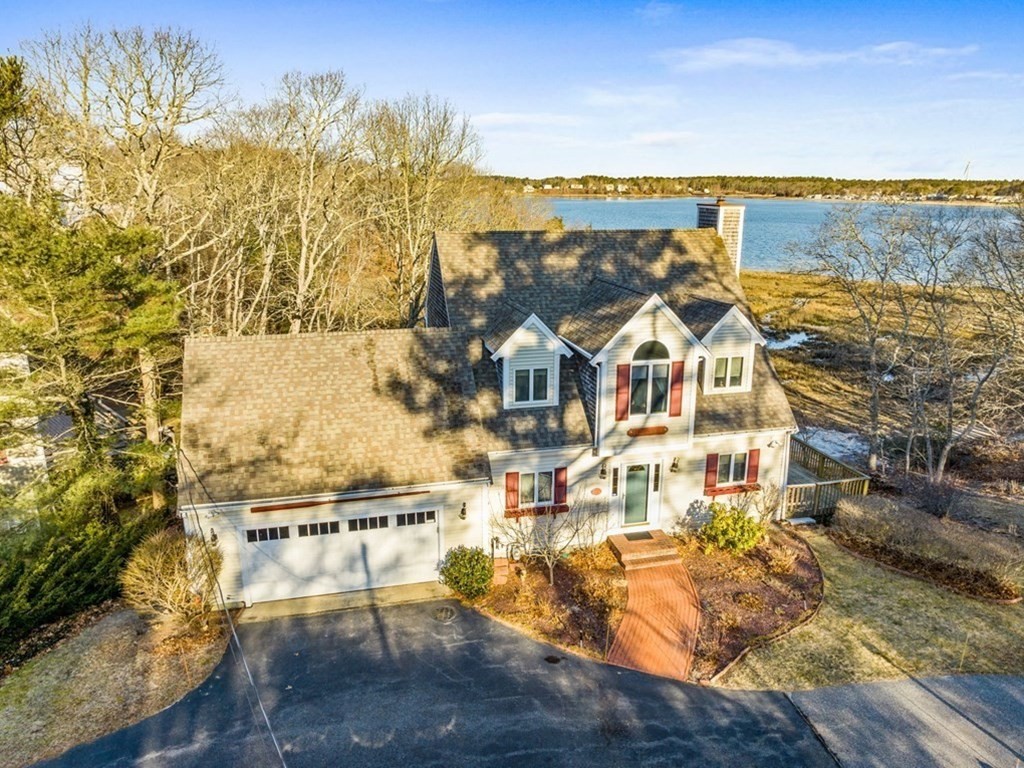 a view of a city with an ocean view